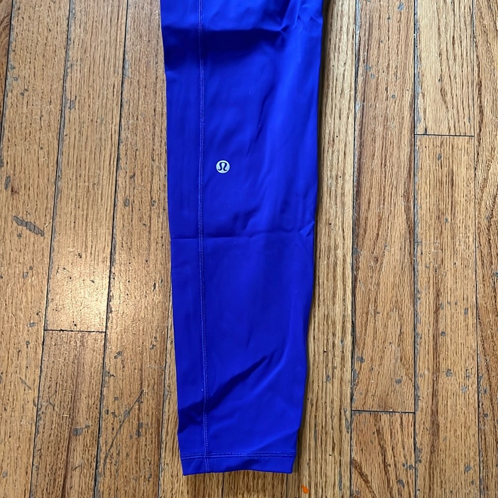 Purple lululemon tights, size 8